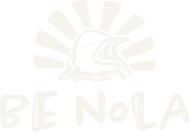 An illustrated bird with sun rays. The Be Nola granola logo
